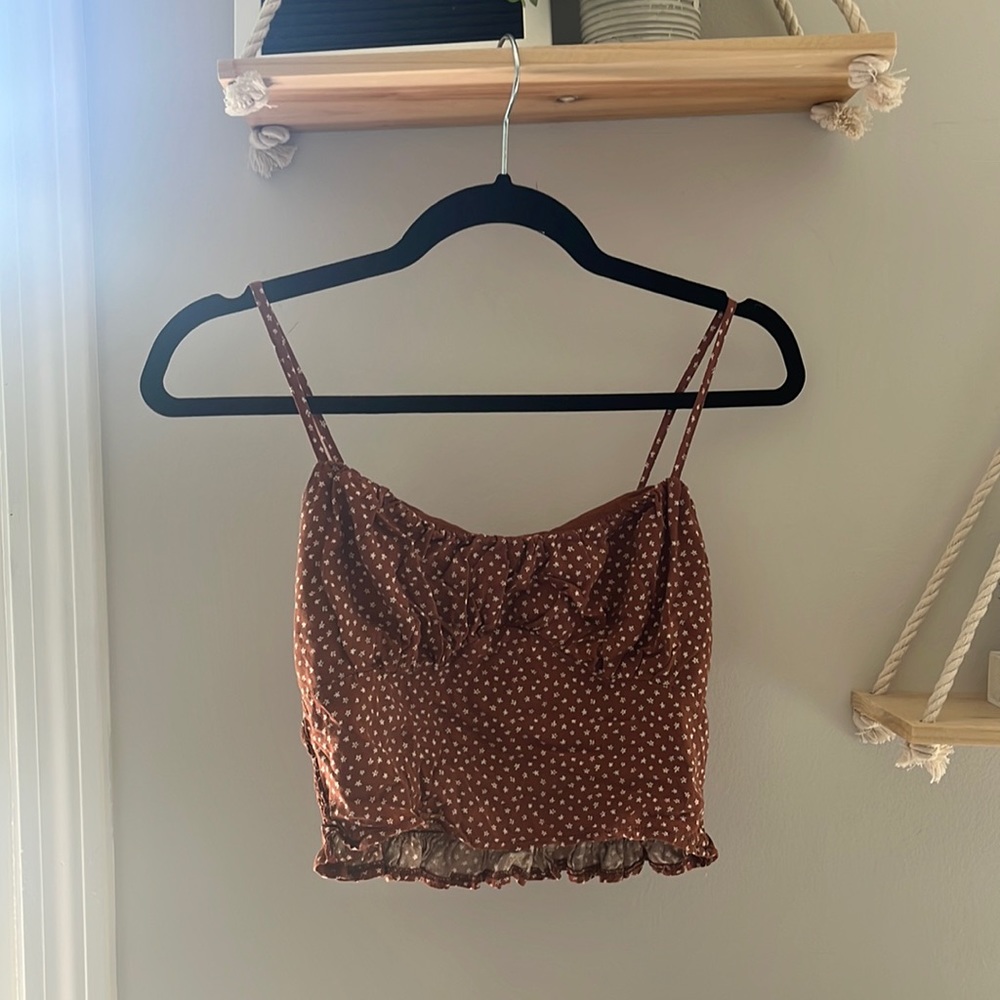 brown tank top with white flowers